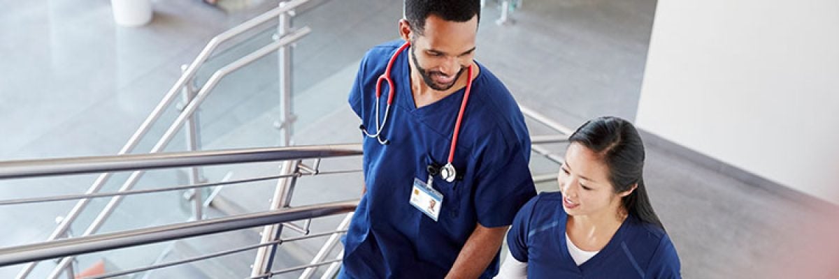 NKU_RNBSN_Explore-header Two nurses walking and talking
